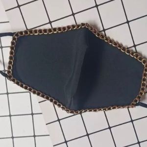 Black and gold face mask